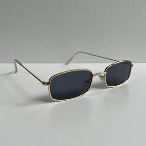 vintage y2k 90s 2000s unique slim style gold trim sunglasses